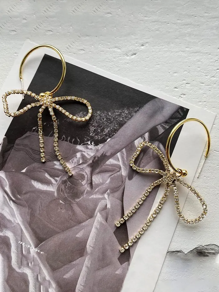 Earrings Yellow Chimes Yellow Chimes Earrings for Women and Girls Drop Earrings for Girls Gold Toned Crystal Studded Bow Designed Drop Earrings Birthday Gift for girls and women Anniversary Gift for Wife